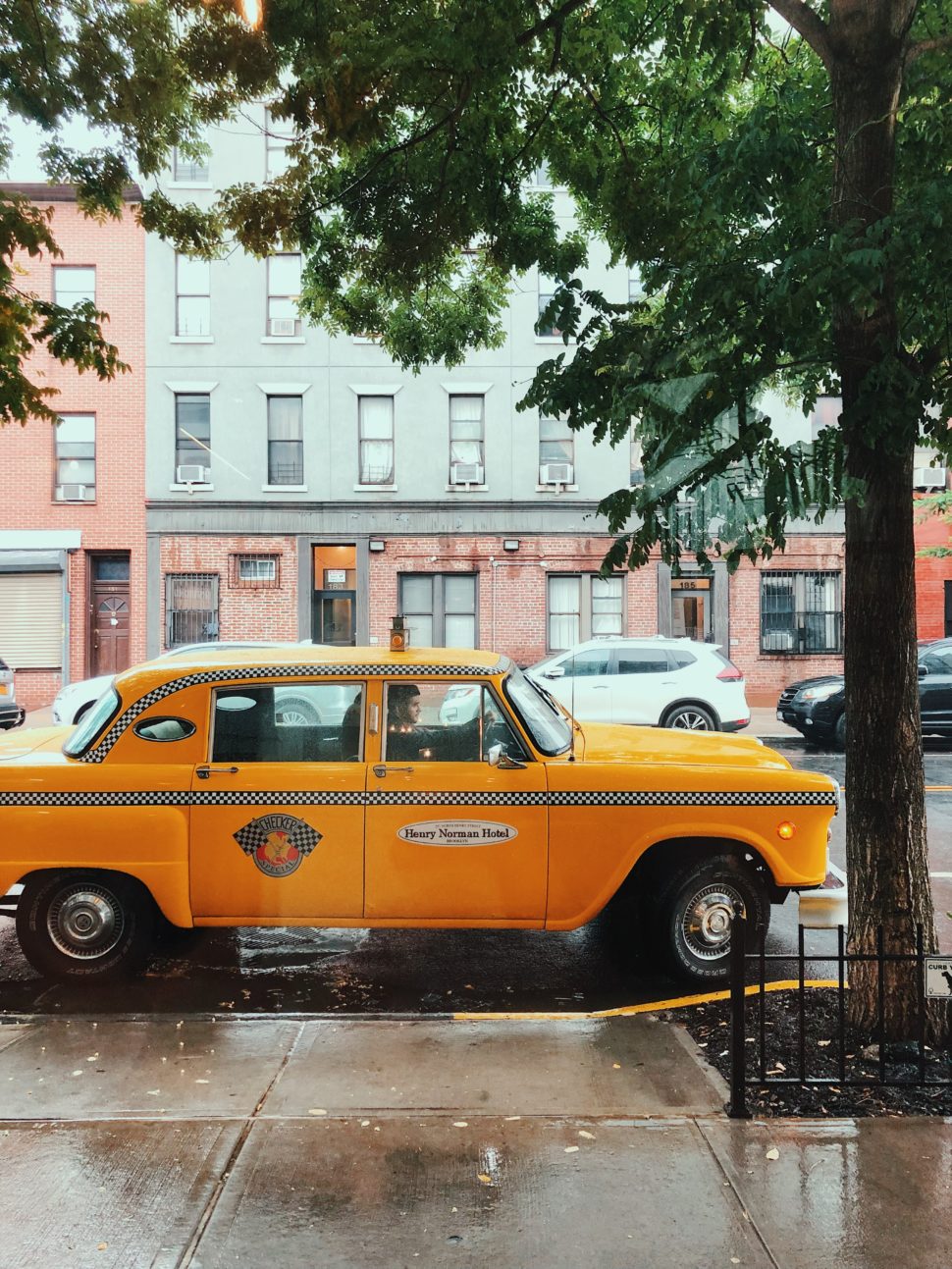 Henry Norman Hotel Signature Vintage Yellow Cab.